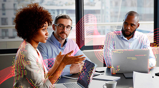 Three businesspeople in discussions